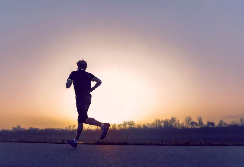 Enduring Faith - Bob Sawvelle - marathon runner running at dusk