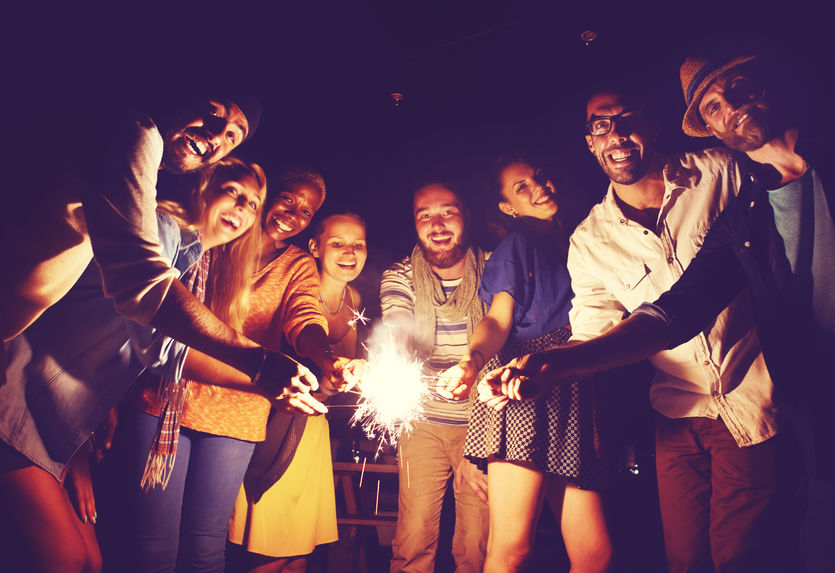 Independence or Interdependence? - Bob Sawvelle group of people holding sparklers together