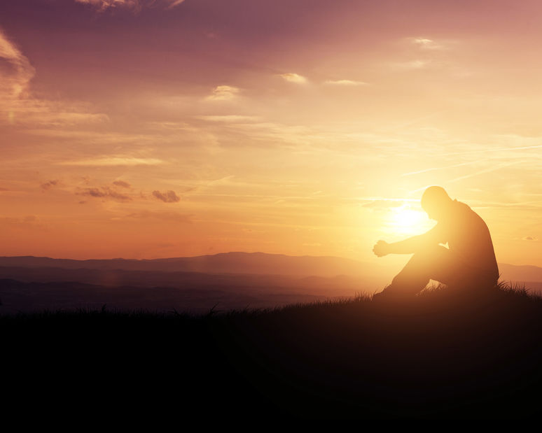 Lord, Teach Us to Pray - Bob Sawvelle - Man praying as the sun rises in the mountains.